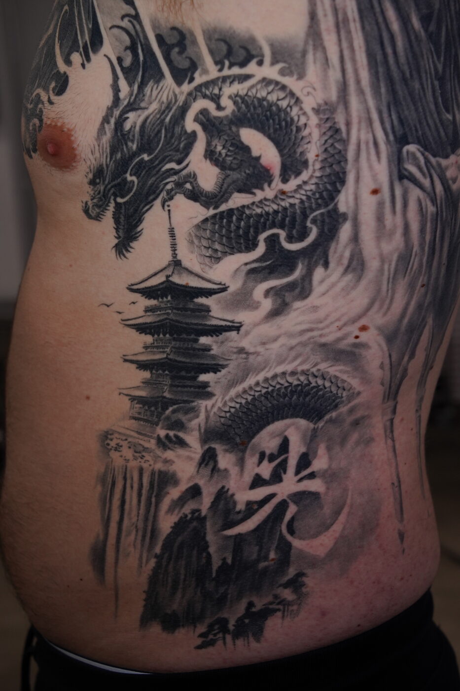 Black and grey surrealism tattoo by Zackel
